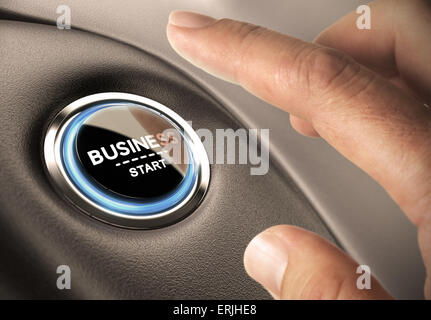 Finger pressing business button. Blue and black tones. Start up concept. Stock Photo