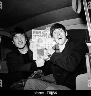 Paul makes the front page, John Lennon & Paul McCartney with copy of Daily Mirror Newspaper. 13th November 1963. Stock Photo