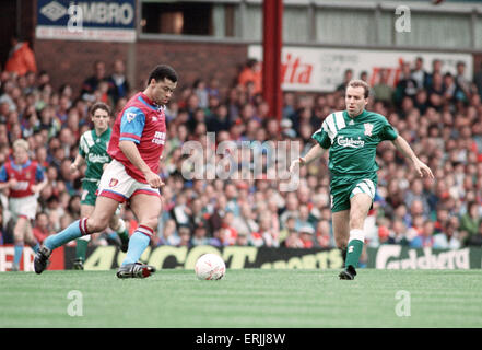 Aston Villa footballer Paul McGrath in action during the Premier league match against Liverpool at Villa Park, faced by Ronnie Rosenthal. 19th September 1992. Stock Photo