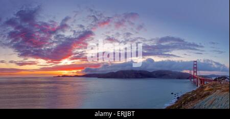 Amazing panoramic sunset over the Marin Headlands at the Golden Gate Bridge Stock Photo