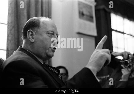 Dr Richard Beeching, Chairman of British Railways, pictured in his office, 15th March 1961. He became a household name in Britain in the early 1960s for his report 'The Reshaping of British Railways', commonly referred to as 'The Beeching Report', which led to far- reaching changes in the railway network, popularly known as the Beeching Axe. Source Wikipedia. Stock Photo