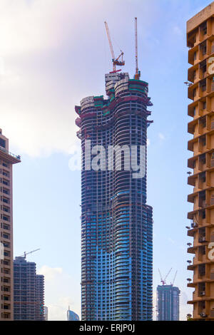 Mumbai, India. 28th May, 2015. 28 May 2015 - Mumbai - INDIA.Construction in full swing at the The World One Towers Complex at Lower Parel.World One is a supertall residential skyscraper under construction in Mumbai, India. It is located in Lower Parel within Mumbai on the 7.1-hectare (17.5-acre) defunct Shrinivas Mill site.The project will cost ?20 billion (US$320 million) and is expected to be completed in 2016, becoming the world's tallest residential tower.World One's architect is Pei Cobb Freed & Partners and the structural engineer is Leslie E. Robertson Associates. Apartment prices in Stock Photo