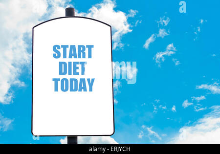 Start Diet Today motivational quote written on white road sign isolated over clear blue sky background. Concept image with available copy space Stock Photo