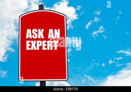Ask An Expert motivational quote written on red road sign isolated over clear blue sky background. Stock Photo