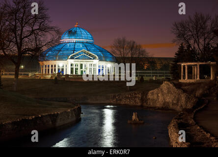 The Marjorie McNeely Conservatory and frog pond. The Palm Dome was lit up blue on April 2 for World Autism Awareness Day. The co Stock Photo