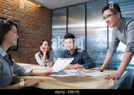 Business people having meeting in board room Stock Photo