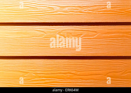 Golden colored plastic wood effect wall decoration Stock Photo