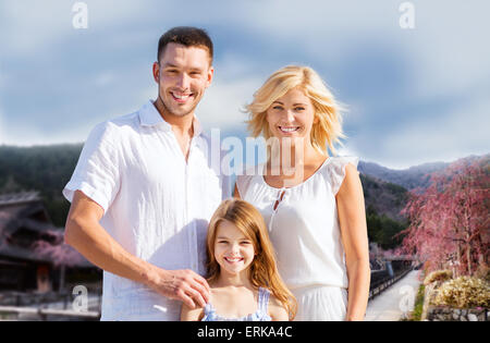 happy family over hills background Stock Photo
