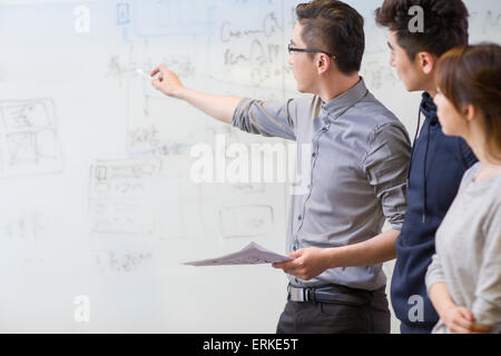 Business people having a meeting in board room Stock Photo
