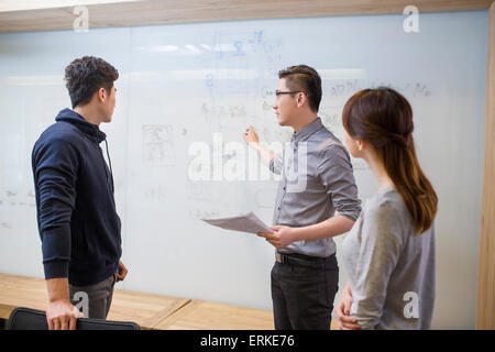 Business people having a meeting in board room Stock Photo
