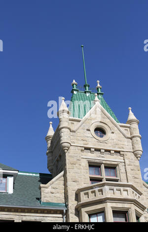 Sandstone school building with separate boys and girls entrances Stock Photo