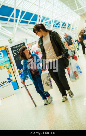 shoppers main thoroughfare Serpentine Green Shopping Centre, Peterborough PE7 8BE. The site is owned by British Land PLC. Stock Photo