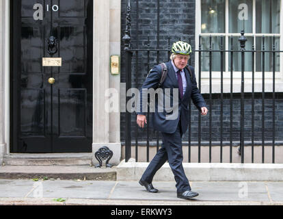 Mayor of London,Boris Johnson,leaves Number 10 Downing Street wearing his Cycle helmet.He is MP for Uxbridge and South Ruislip Stock Photo