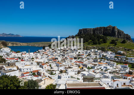 Panoramic view of beautiful Lindos village with its castle (Acropolis), Rhodes, Dodecanese Islands, Greek Islands, Greece Stock Photo