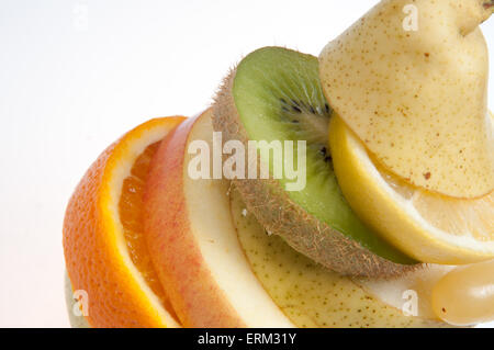 Pile of sliced fruit on a white background Stock Photo