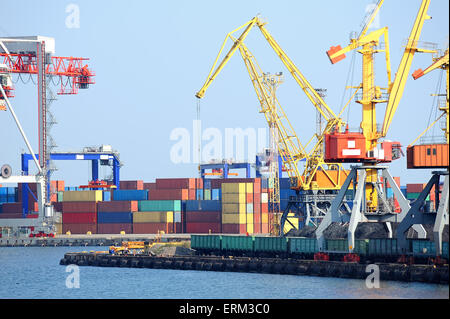 Port warehouse with containers and industrial cargoes Stock Photo