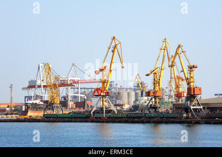 Port warehouse with containers and industrial cargoes Stock Photo