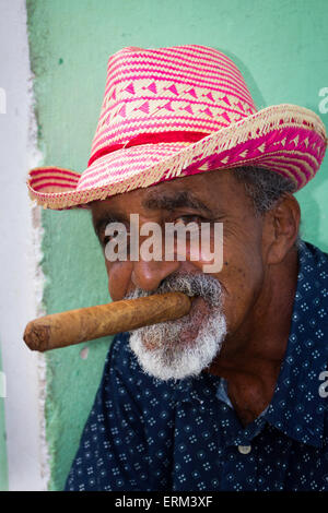 Portrait of elderly Cuban man with big cigar in Trinidad Stock Photo