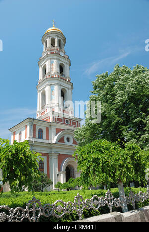 the church bell tower and garden trees Stock Photo