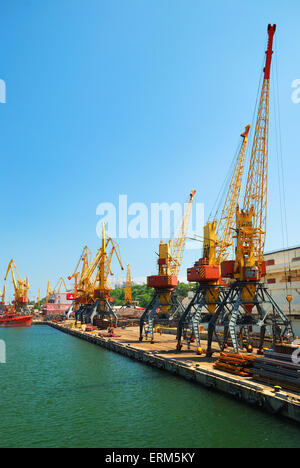 Port warehouse with containers and industrial cargoes Stock Photo