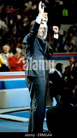 New York, NY., USA, 16th July 1992 Arkansas Governor William Clinton introduces his running mate Senator (D-TN) Albert Gore Jr. to the Democratic National Convention in New York. The 1992 National Convention of the U.S. Democratic Party nominated Governor Bill Clinton of Arkansas for President and Senator Al Gore of Tennessee for Vice President; Clinton announced Gore as his running-mate on July 9, 1992. The convention was held at Madison Square Garden in New York City, New York from July 13 to July 16, 1992. Stock Photo