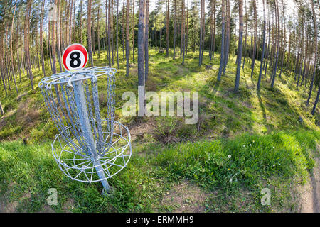 Disc golf hole in the woods. Fisheye capture. Stock Photo