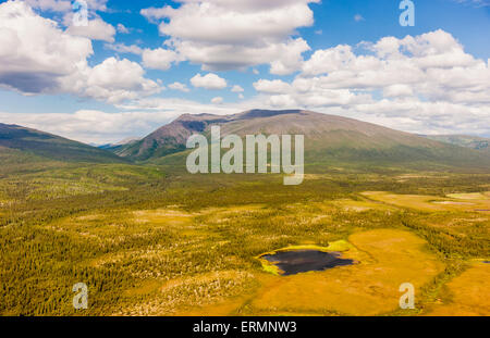 Aerial view of the Baird Mountains, green tundra and a small lake, Shungnak, Arctic Alaska, summer Stock Photo