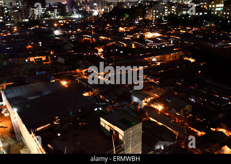 Dhaka, Bangladesh . 5th June, 2015. A Night view of Rupnagar slum at Mirpur in Dhaka, Bangladesh.ON June 4, 2015  Bangladesh is one of the world's most densely populated countries. Millions of people have settled in slums of Dhaka, a mega city, mostly living in risky settlements after knowing all the possibilities of accidents. The slum people even do not have access to basic amenities. Credit:  Mamunur Rashid/Alamy Live News Stock Photo