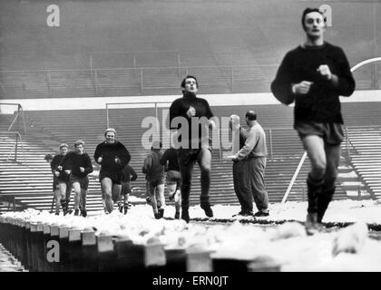 Birmingham City team training at St Andrews but conditions were so bad they moved indoors. On the run right to left are: Malcolm page, Mick Darrell, David Robinson and John Sleeuwenhoek. 1st January 1969. Stock Photo
