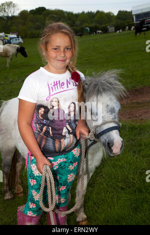 Appleby, Cumbria, Uk. 5th June, 2015.  Nikita Price, 10 years old with her pony at the Appleby Horse Fair in Cumbria.  The Fair is an annual gathering of Gypsies and Travellers which takes place on the first week in June, and has taken place since the reign of James II, who granted a Royal charter in 1685 allowing a horse fair 'near to the River Eden', and is the largest gathering of its kind in Europe. Stock Photo