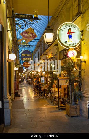 Evening at Passage des Panoramas - b 1800, the oldest of the covered passages of Paris, France Stock Photo