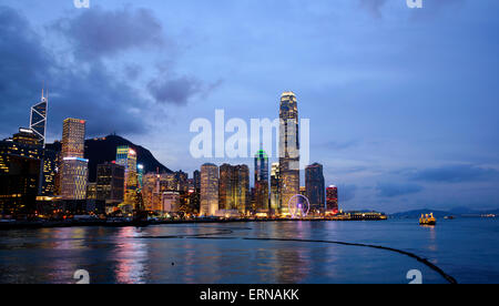 Hong Kong observation wheel and the IFC2 building, Victoria harbor, Hong Kong, China. Stock Photo