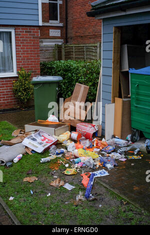 Overflowing bins in flat shared bins Stock Photo
