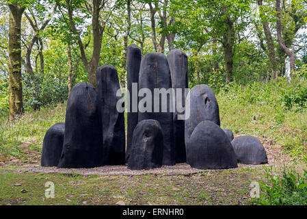 ' Black Mound '  a work by David Nash on show at Tremenheere sculpture gardens near Penzance, Cornwall, England, UK Stock Photo