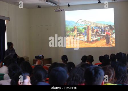 Kathmandu, Nepal. 5th June, 2015. Nepalese people attend a presentation of Portuguese architect Joao Boto Caeiro on low cost pre-fabricated houses suitable for Nepalese people in Kathmandu, Nepal, June 5, 2015. Architects from different countries are in Nepal to present their sample models after many houses have been damaged by massive earthquakes. © Sunil Sharma/Xinhua/Alamy Live News Stock Photo