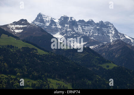 Dents du Midi (distant mountains) in the Chablais Alps, seen from Trient, Switzerland. Stock Photo