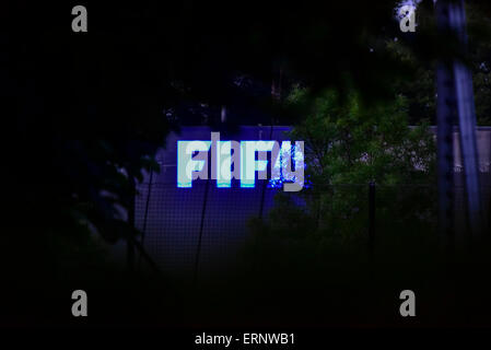 FIFA logo at the facade of the dark FIFA headquarters in Zurich, taken on the night Sepp Blatter announced his resignation as FIFA president. Stock Photo