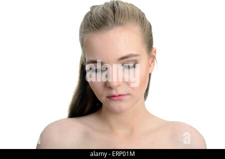 Girl with shy, sad face expression. Young female model from Poland. Stock Photo
