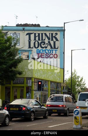 29 May 2015 - Bristol, UK : Think Local, Boycott Tesco, a campaigning message on Stokes Croft Stock Photo