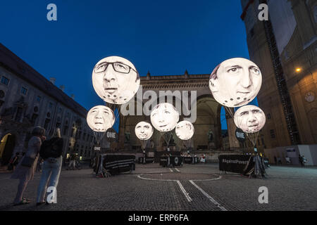 Munich, Germany. 05th June, 2015. Ballons bearing the faces of the G7 members showing (L-R) Japanese Prime Minister Shinzo Abe, French President Francois Hollande, Italian Prime Minister Matteo Renzi, GermanChancellor Angela Merkel, Canadian Prime Minister Stephen Harper, British Prime Minister David Cameron and US President Barack Obama in Munich Germany, 05 June 2015. Heads of state and government of the seven leading industrialized nations (G7) are scheduled to meet in Elmau Castle, Bavaria, on June 7-8 as the climax of Germany's presidency of the G7. Photo: Armin Weigel/dpa © dpa picture Stock Photo