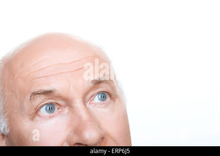 Agreeable grandfather looking up Stock Photo