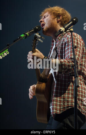 Grammy nominated British singer-songwriter celebrity Ed Sheeran performs in concert as part of his 2015 concert schedule. Stock Photo