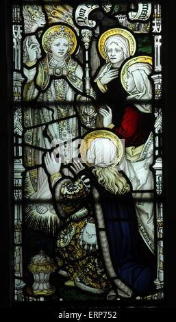 A stained glass window by the Kempe Studios depicting The Three Maries at the Empty Tomb of Jesus, Blatherwycke Church, Northamptonshire Stock Photo