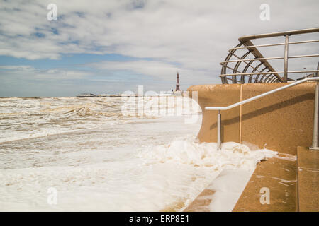 Blackpool, UK. 6th June 2015. UK weather news. A breezy, cool and sunny day in Blackpool Lancashire. The Irish sea takes on a look of a giant foam bath as the strong winds whip up the waves along the shoreline in Blackpool. Credit:  Gary Telford/Alamy Live News Stock Photo