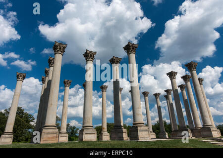 Stone Columns against a cloudy Sky Stock Photo