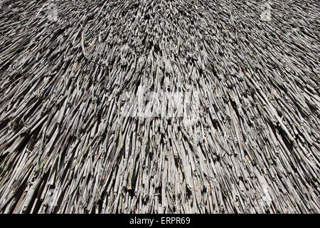 Traditional old thatched straw roof background or texture Stock Photo