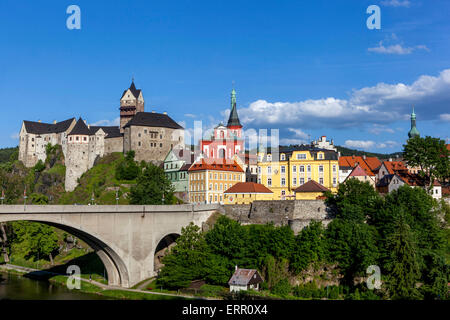 Colourful Historical Old Town Loket nad Ohri, Region Karlovy Vary, West Bohemia, Czech Republic Loket Castle on Rock, Bridge spanning the river Stock Photo