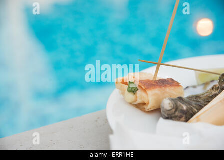 A really beautiful happy hour on the pool side. Stock Photo