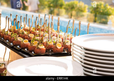 A really beautiful happy hour on the pool side. Stock Photo