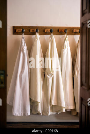 Gowns or cowls belonging to Cistercian Nuns at Holy Cross Abbey near Whitland, Pembrokeshire Wales, UK Stock Photo
